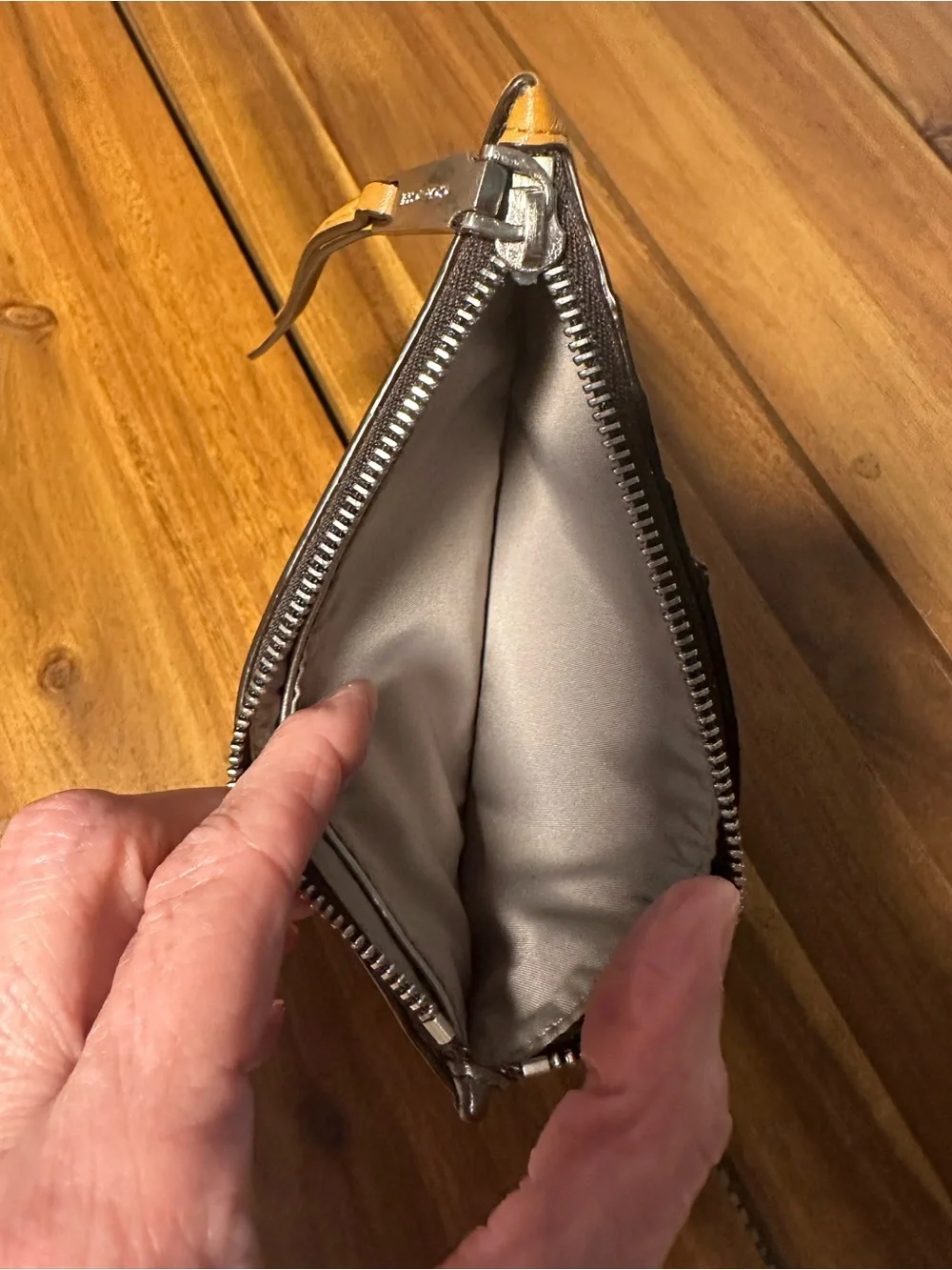 Coach slim zip